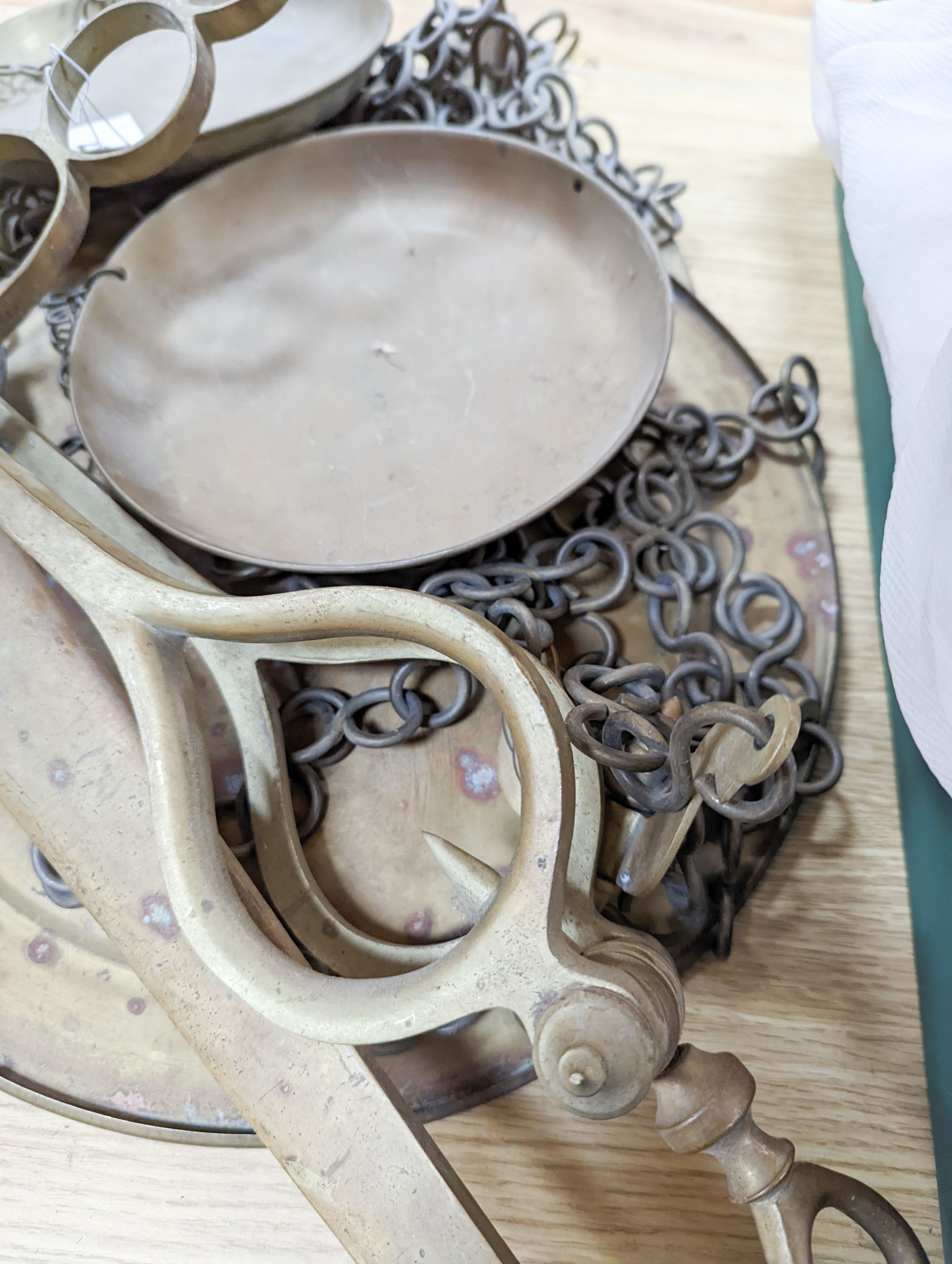 A large set of brass hanging scales, 91cm across